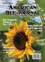 The cover for the August issue of the American Bee Journal. The cover depicts a closeup of a single sunflower with a bee heading towards the flower and greenery in the background. There are three call outs on the cover along with the logo.